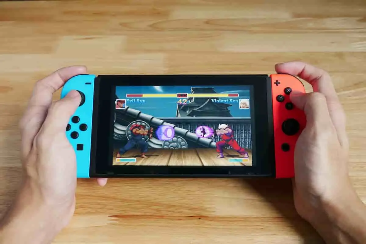Hands holding Nintendo Switch