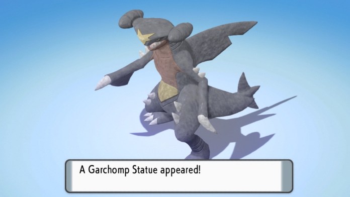 A statue of garchomp from pokemon brilliant diamond