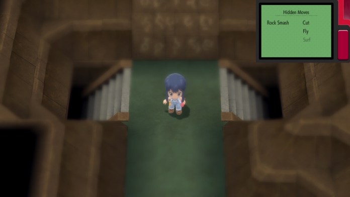 the trainer standing in front of a wall inside solaceon ruins in pokemon brilliant diamond