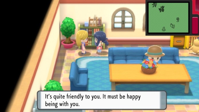 The trainer speaking to an NPC inside the pokemon fan club