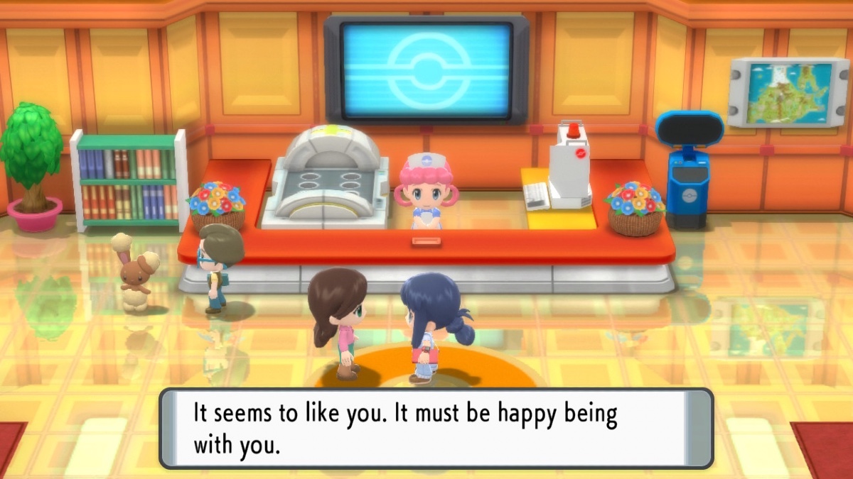 The trainer speaking to an NPC in the Eterna City pokemon center in pokemon brilliant diamond and shining pearl